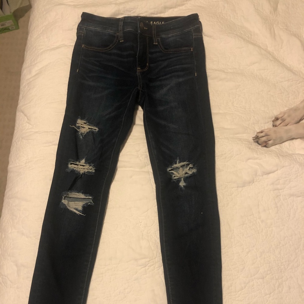 American Eagle ripped blue jeans